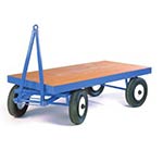 Towable industrial trailers for use with forklifts and tow tug units